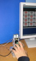 Figure 1c: A picture of a player with his finger on the tactile display.